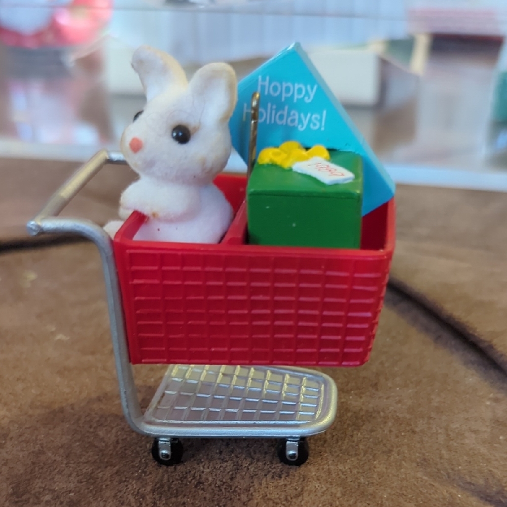 Miniature Bunny in Red Shopping Cart